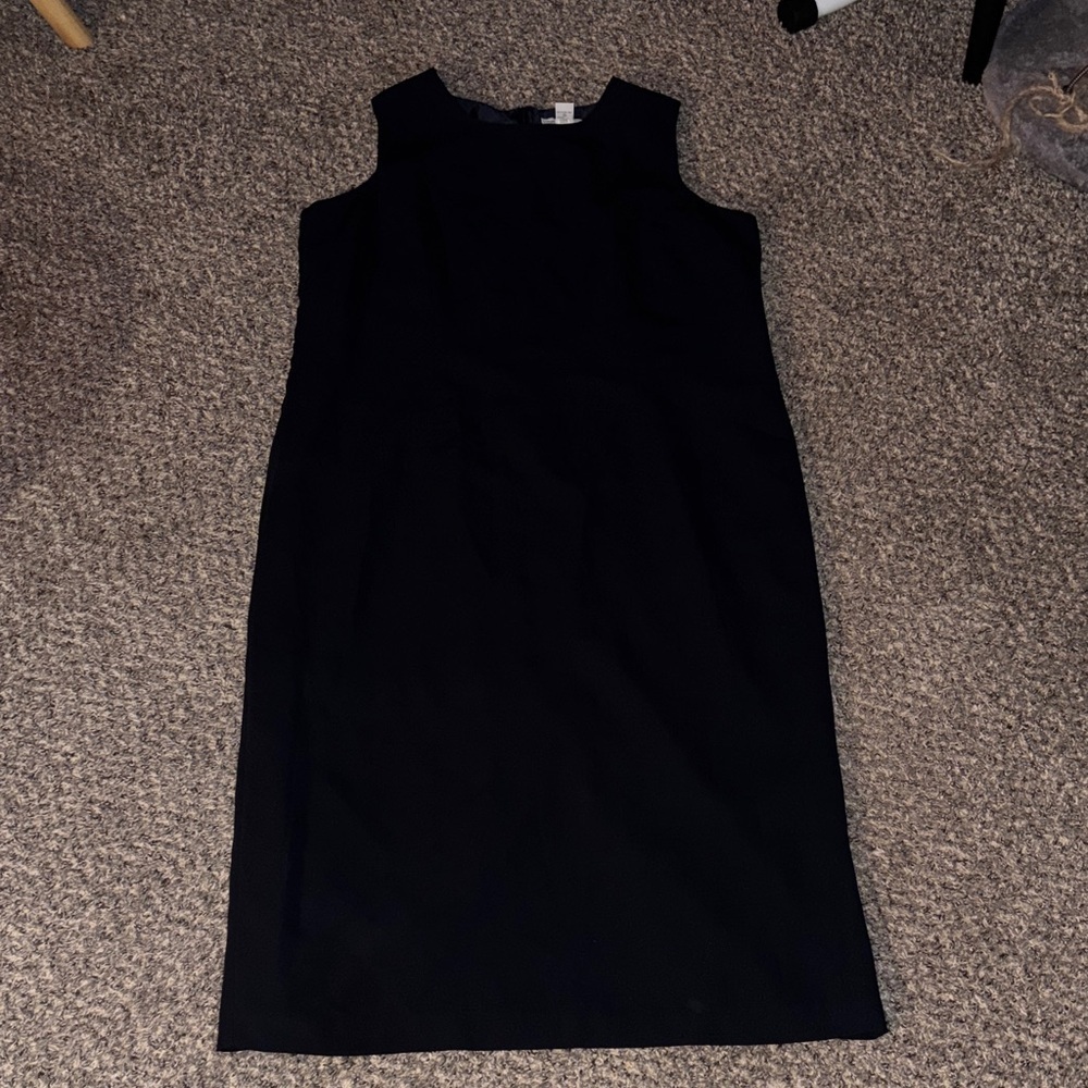 Stephanie Andrew’s Black Midi Dress